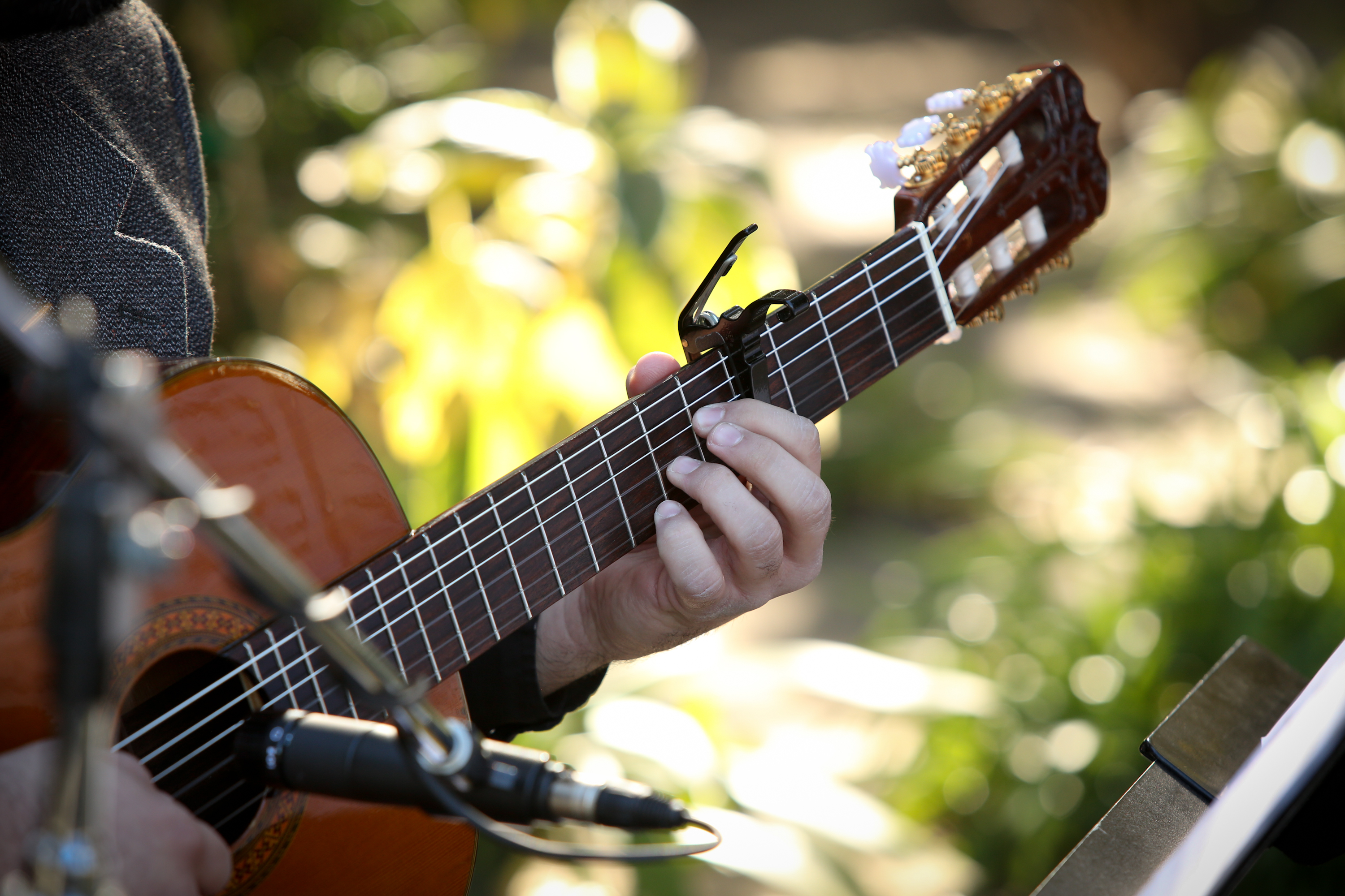 musician playing a guitar as one of the Best Wedding Vendors in Santa Barbara