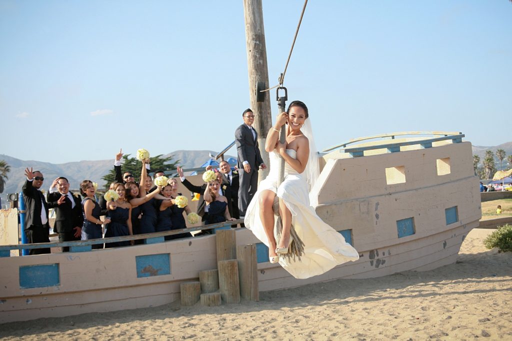 bride zip lining off boat in ventura beach