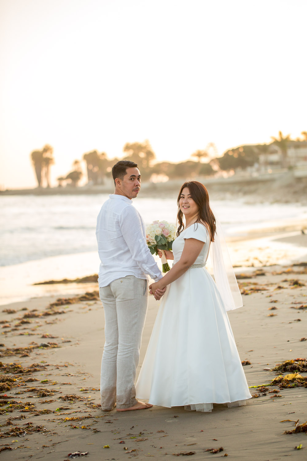 bride and groom on ventura beach