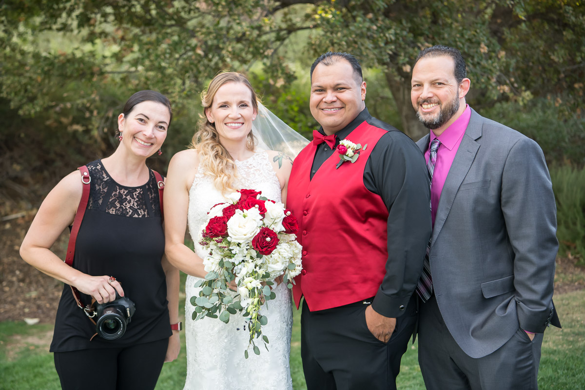 portrait with elizabeth victoria and bride and groom and officiant