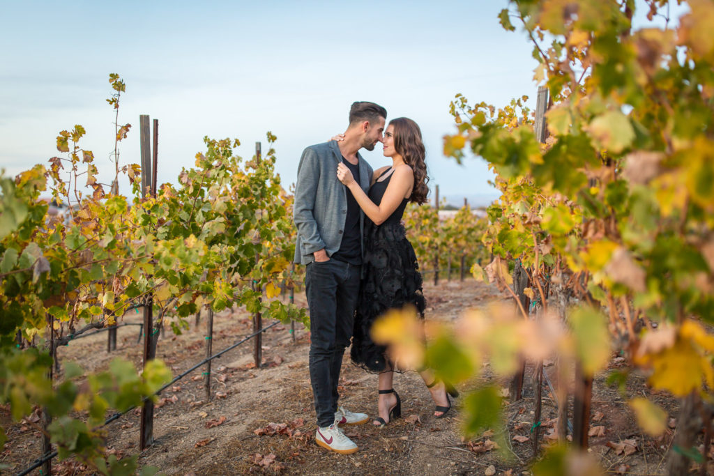 couple standing in allegreto vineyard