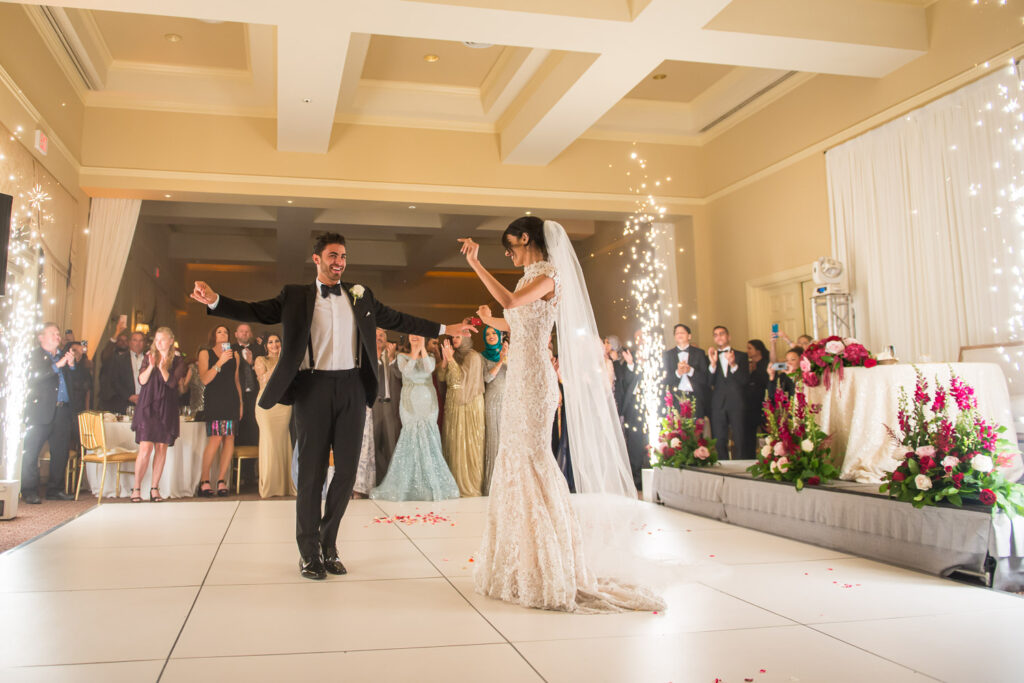 bride and groom dancing with inside sparklers at sherwood country club