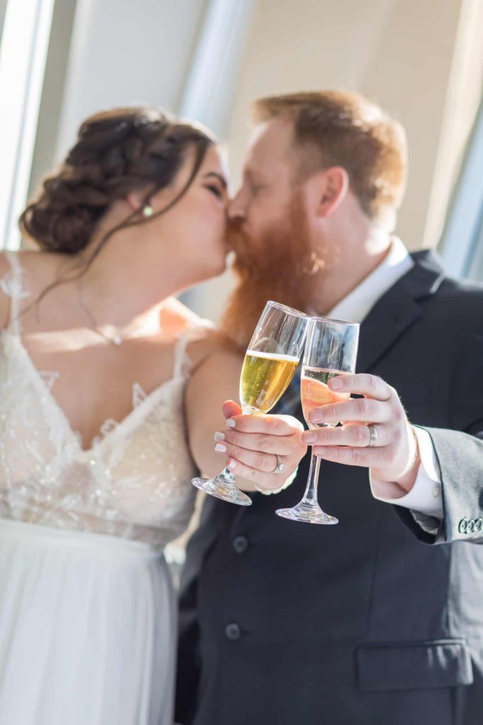 champagne and kissing crowne plaza wedding