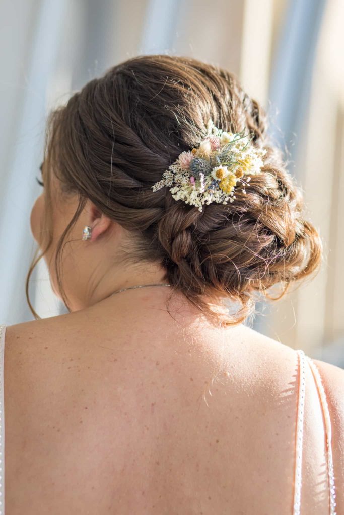 closeup of flowers in brides hair crowne plaza wedding