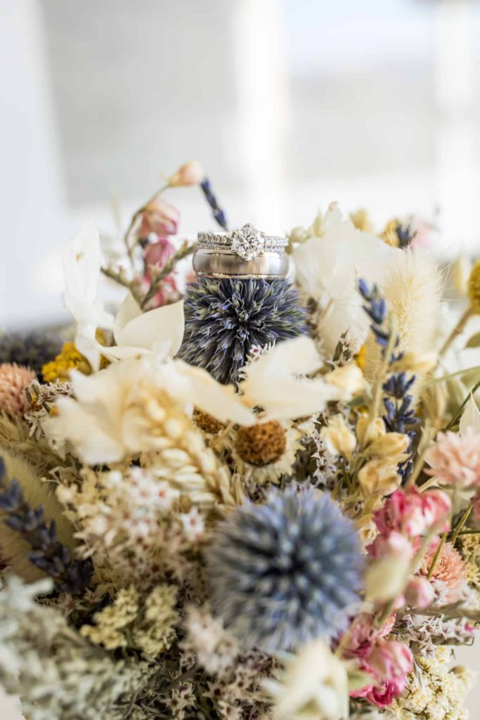rings on dried flowers crowne plaza wedding