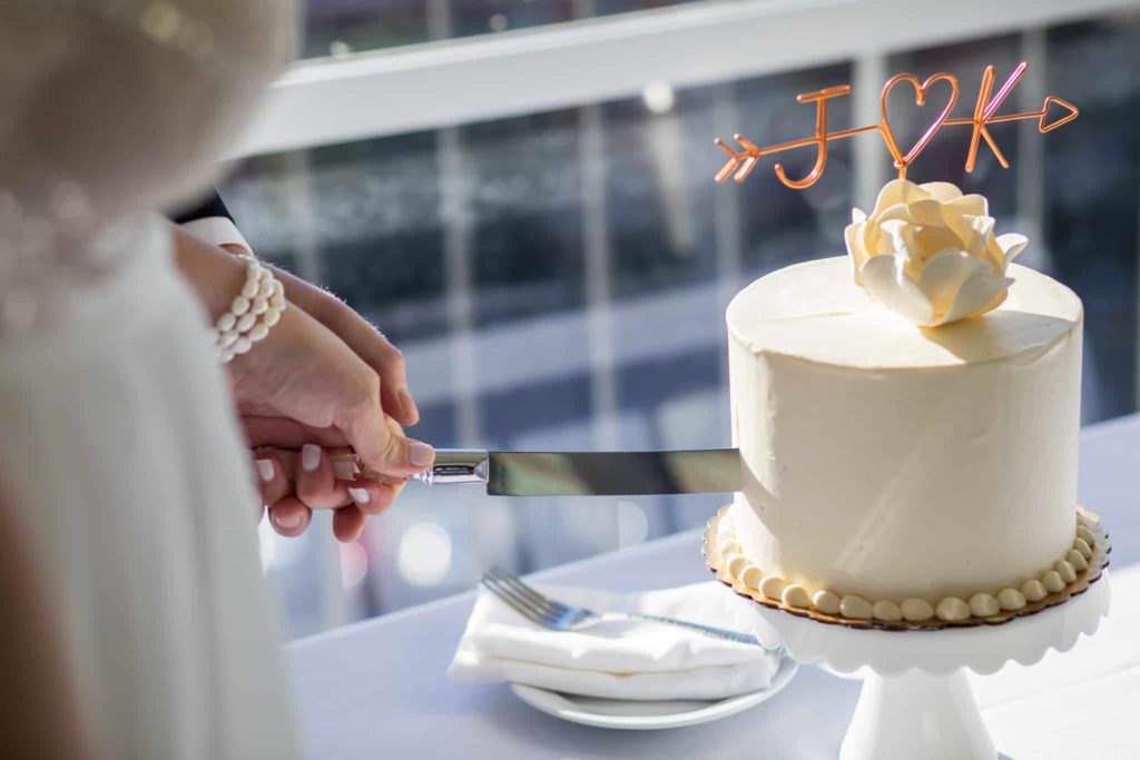 cutting the cake crowne plaza wedding