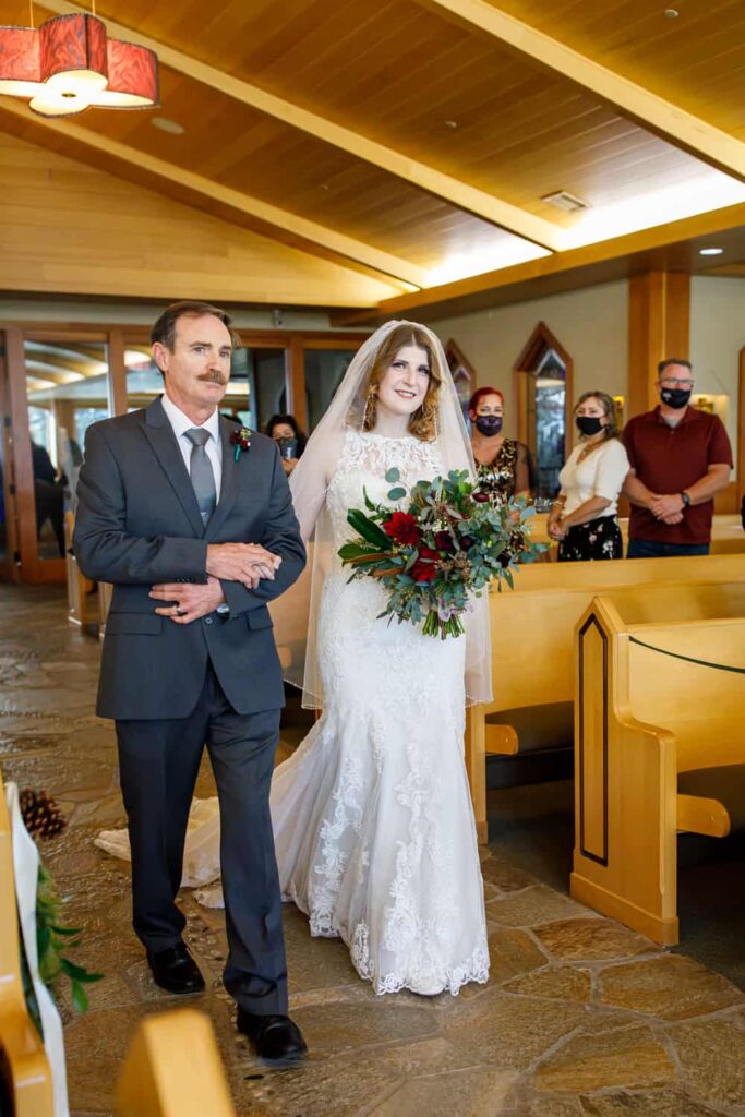 bride and father walking down aisle lake tahoe wedding