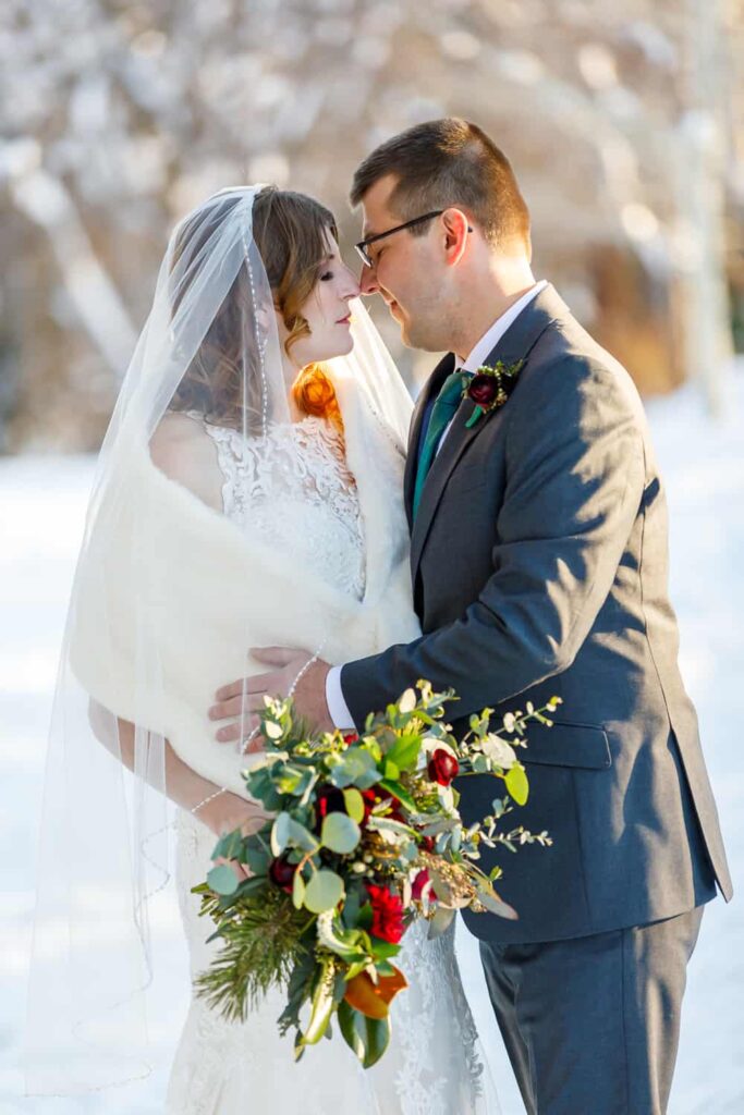 bride and groom in the snow lake tahoe wedding