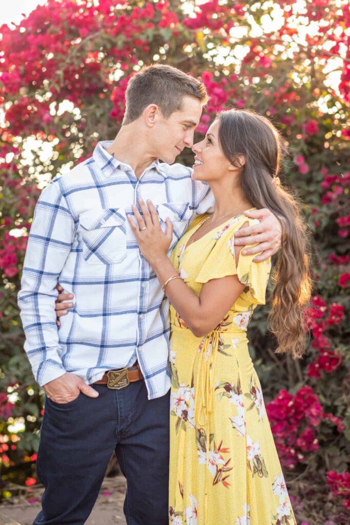 couple in front of flowers santa barbara engagement session
