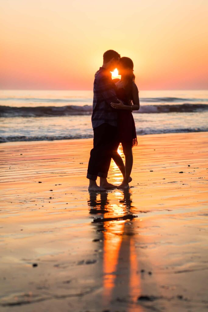 couple on the beach at sunset santa barbara engagement session