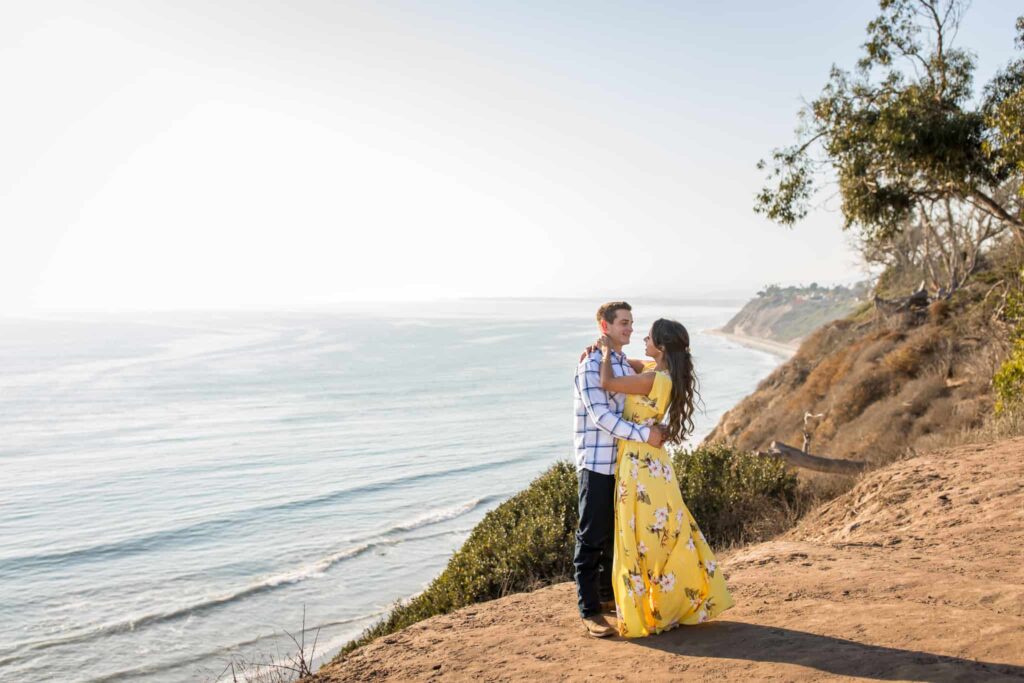 couple on a cliff santa barbara douglas family preserve