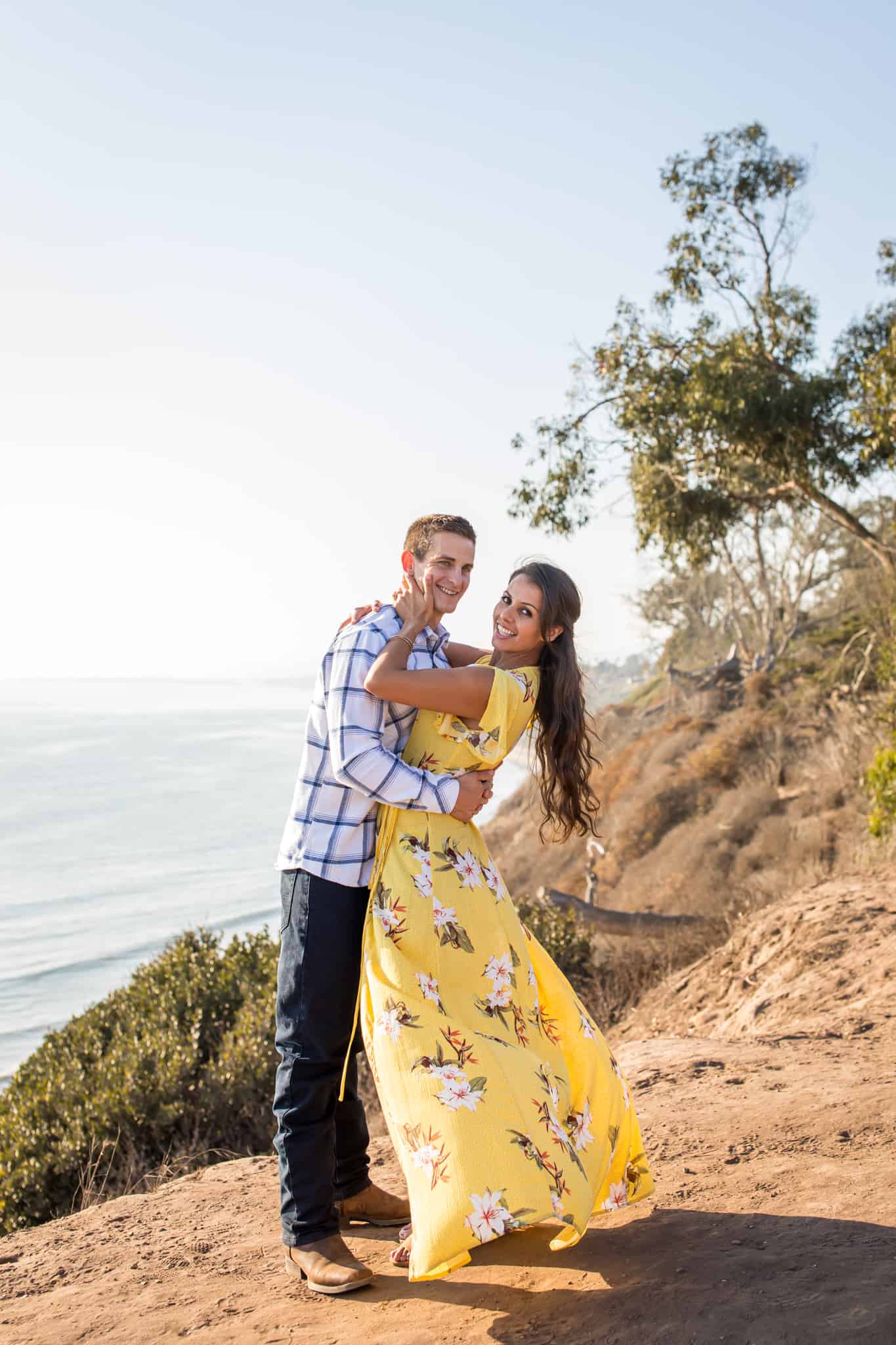 couple on a cliff santa barbara douglas preserve engagement session