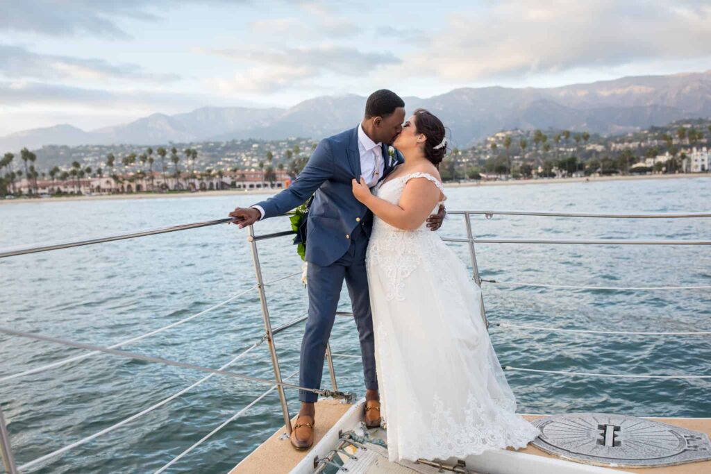 bride and groom kissing Santa Barbara Yacht Wedding