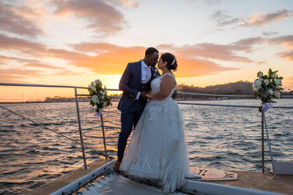 bride and groom at sunset on a yacht Santa Barbara Wedding