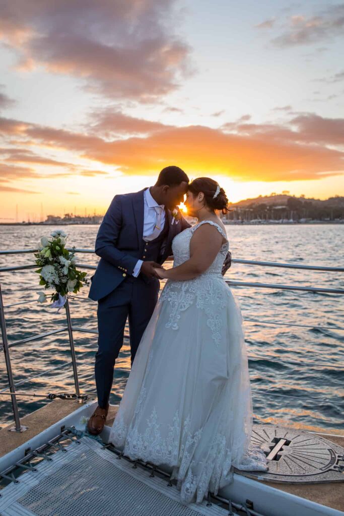 bride and groom at sunset on boat Santa Barbara Yacht Wedding