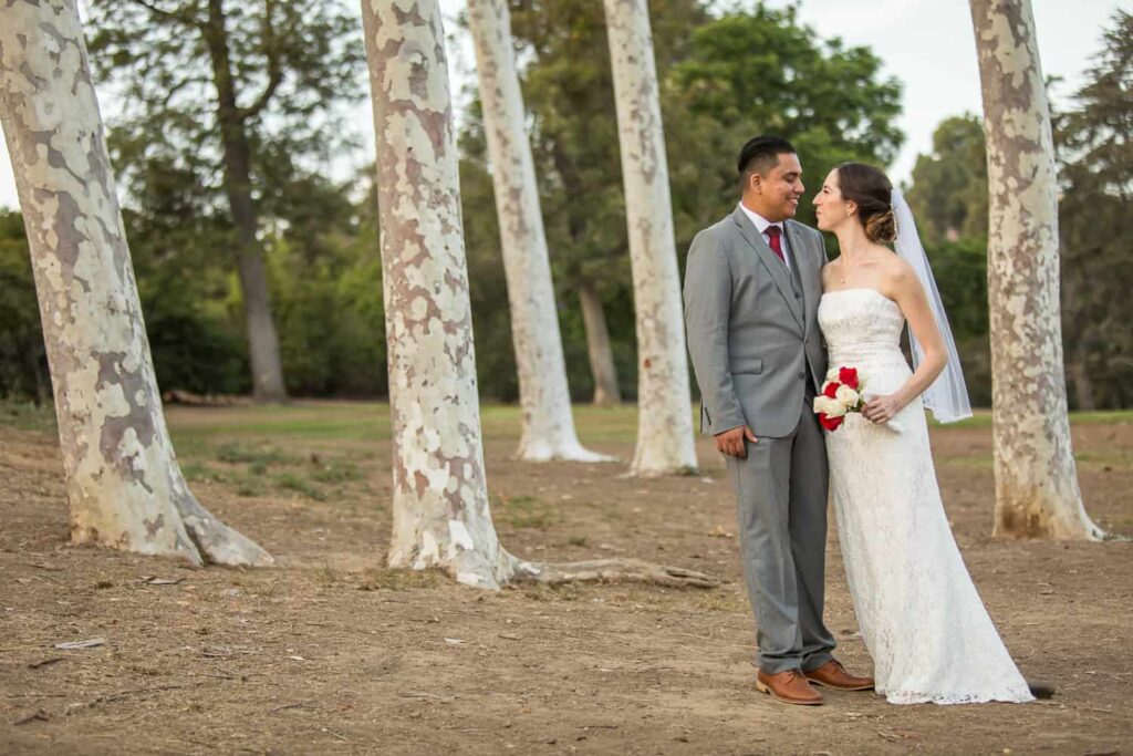bride and groom in a forest ventura park wedding