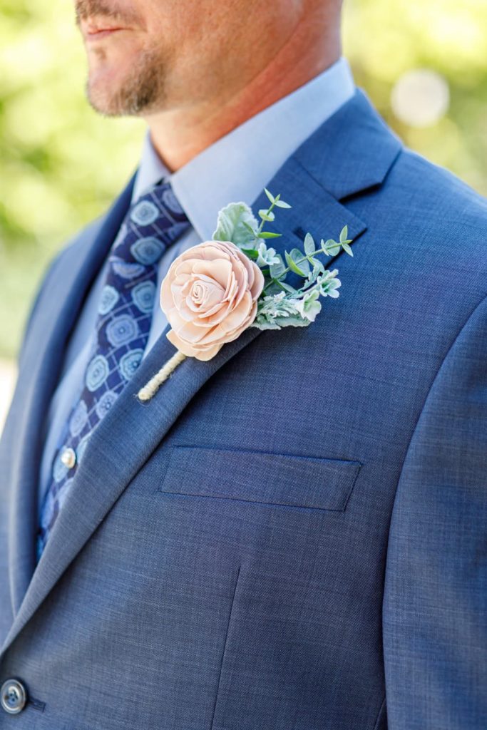 closeup of groom's boutonniere