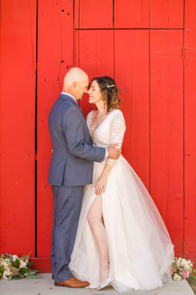 bride and groom at the red barn at camarillo ranch