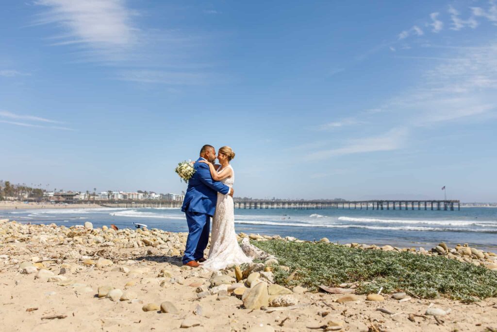 bride and groom on the beach in ventura