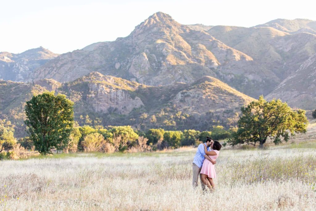 couple in front of mountain at malibu creek state park