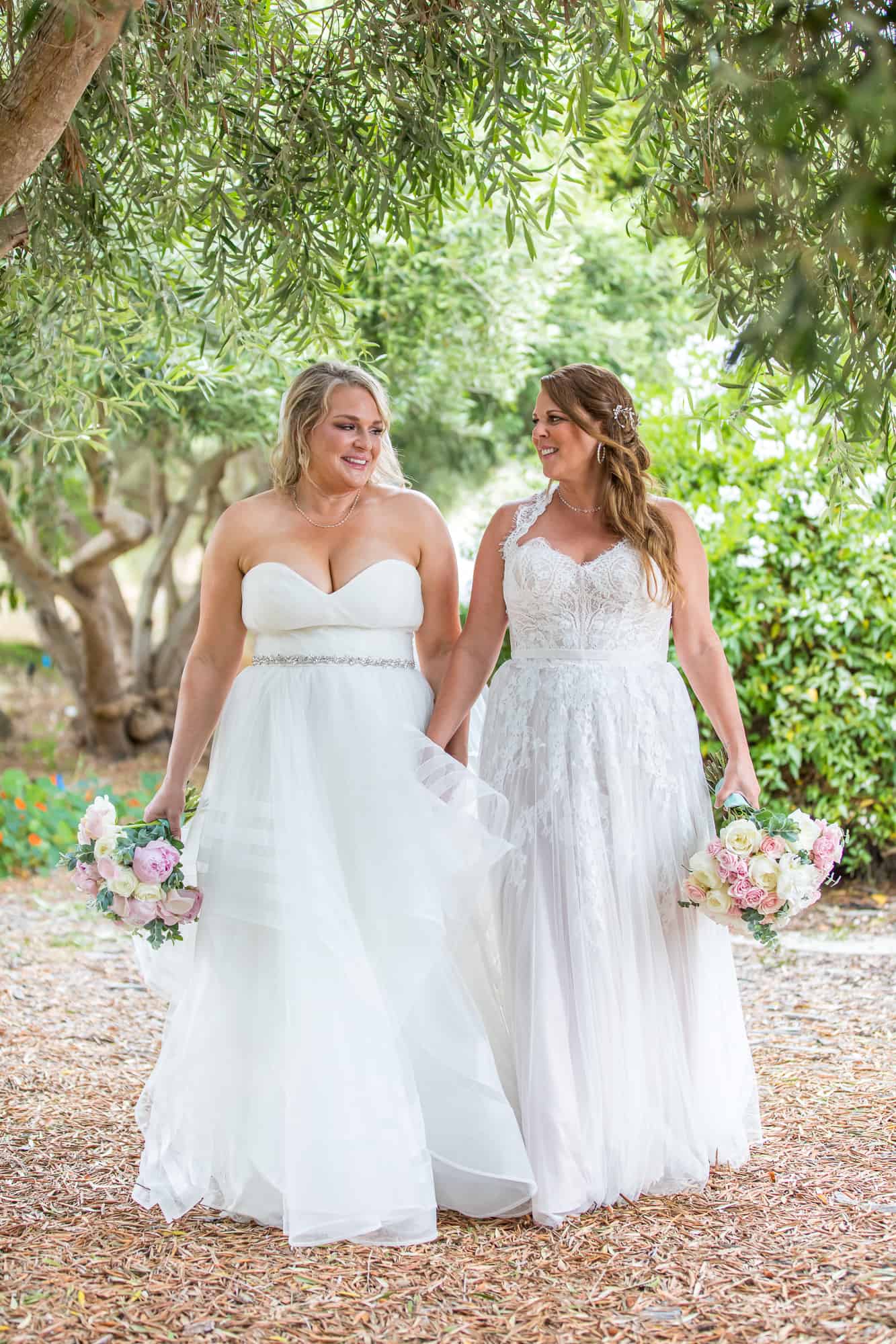 lesbian brides walking together