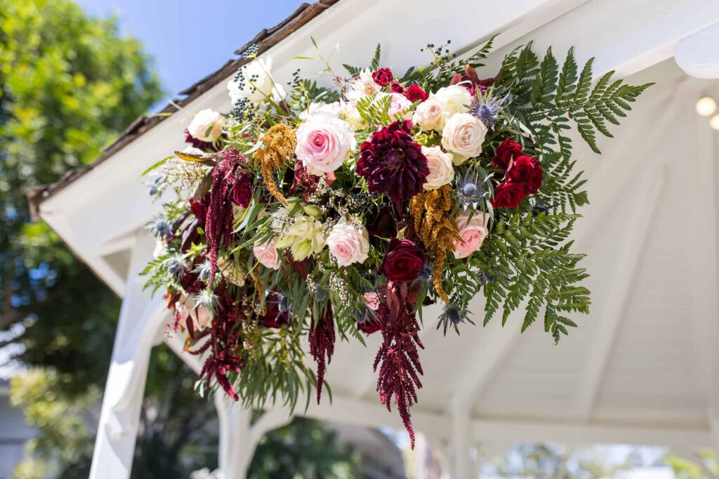 flowers on the ceremony arch