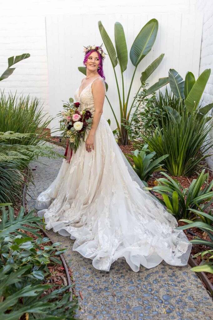 bride with pink hair on her wedding day