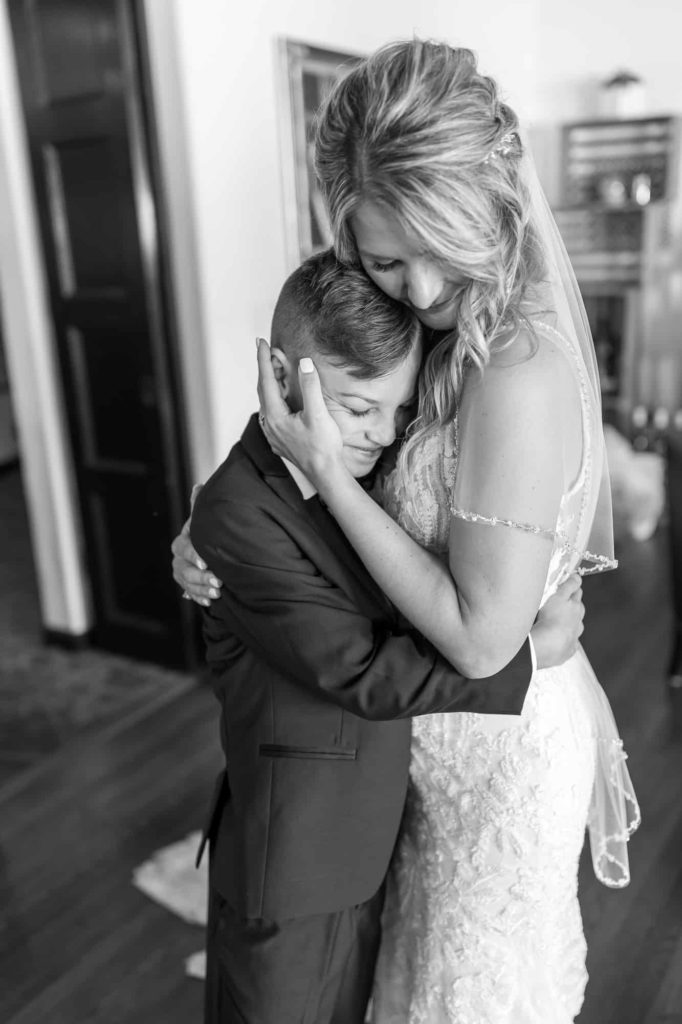 bride hugging her son