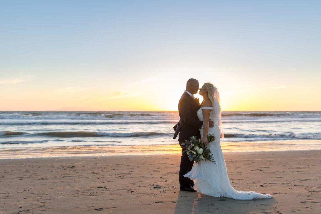 bride and groom standing on mandalay beach