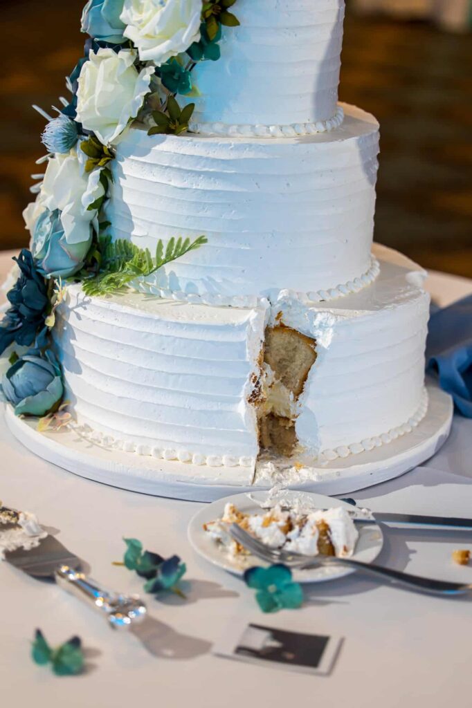 wedding cake with slice cut out