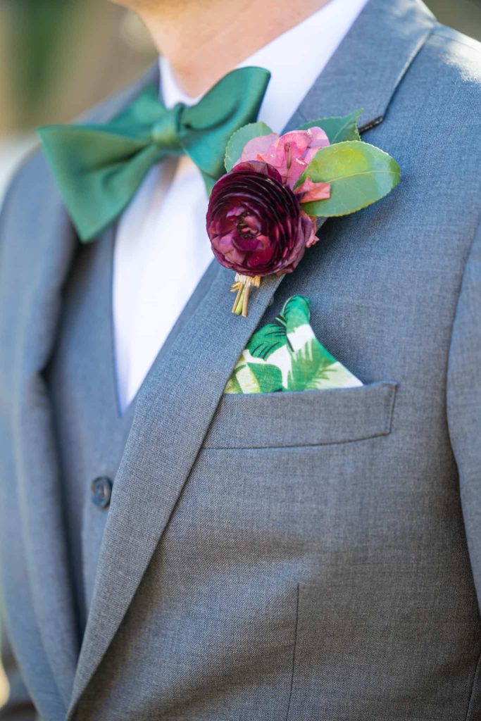 grooms boutonnière and handkerchief with plant design