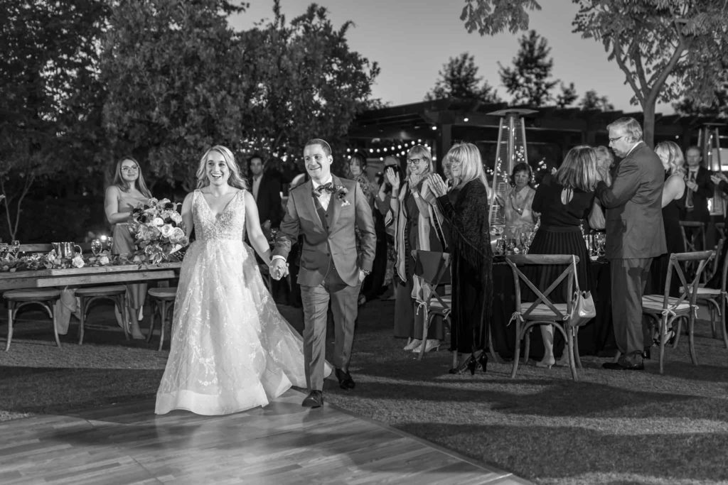 bride and grooms grand entrance los robles greens reception