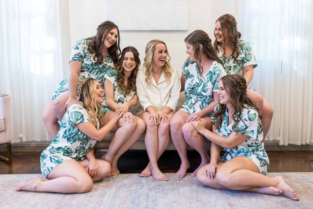 bride with her bridesmaids in plant design robes