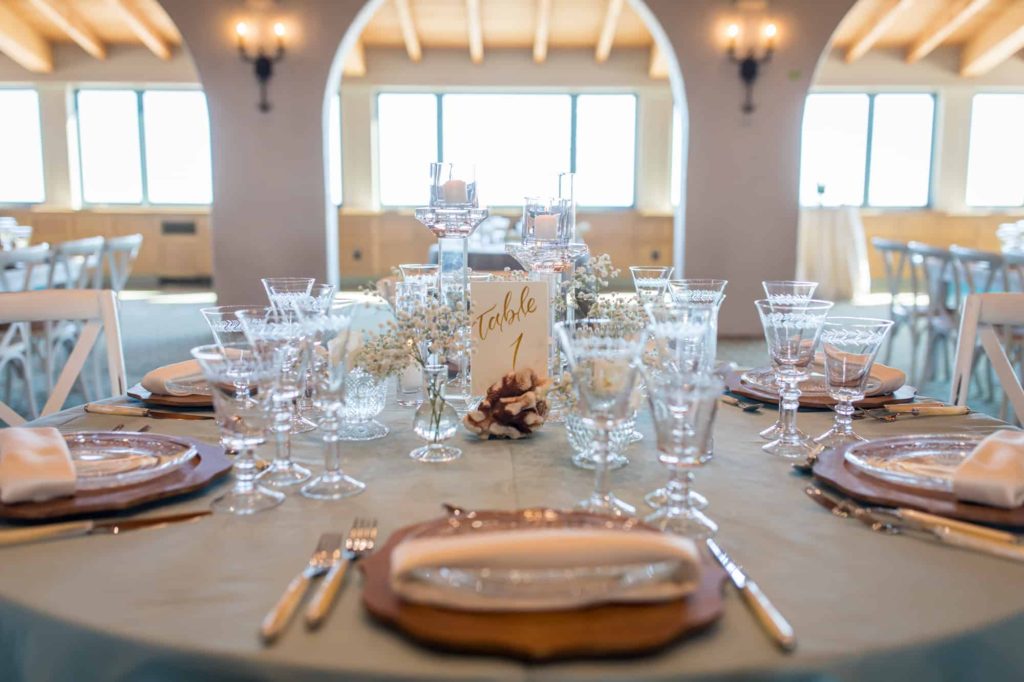 Santa Barbara indoor wedding venue reception table with custom table number and place settings