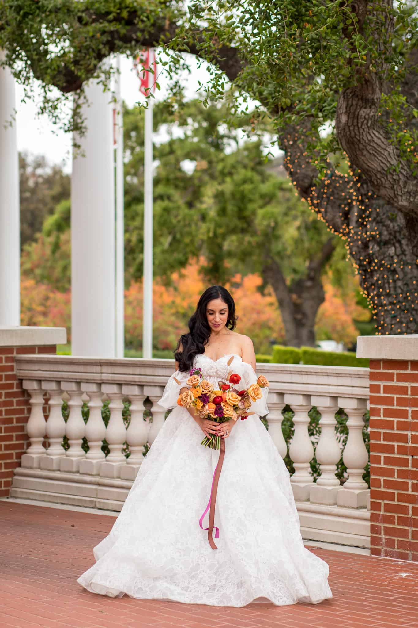 outdoor bridal portraits on brick laid terrace at Thousand Oaks wedding venue