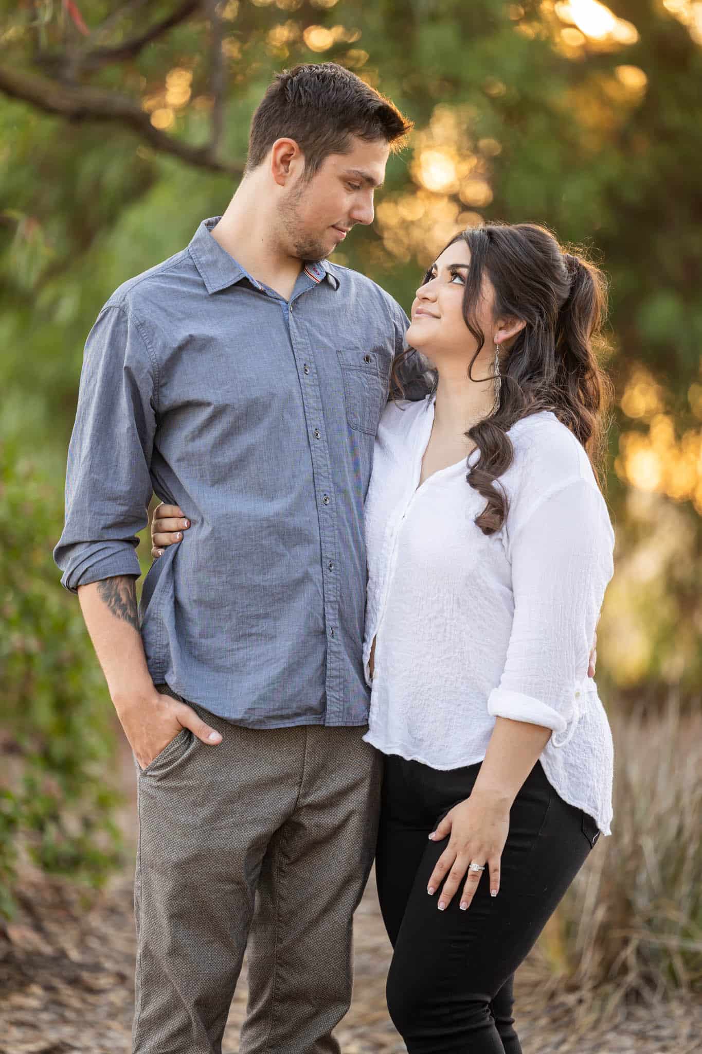 Thousand Oaks wedding photographer photographs engagement photos of man and woman together in a wooded area