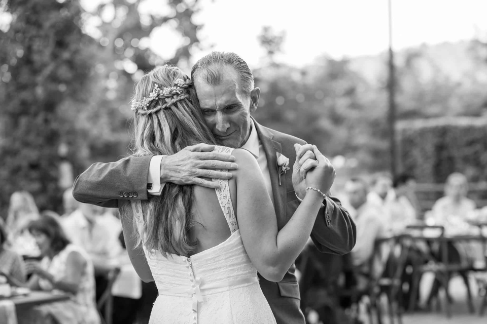 father crying while dancing with daughter on her wedding day at walnut grove in moorpark