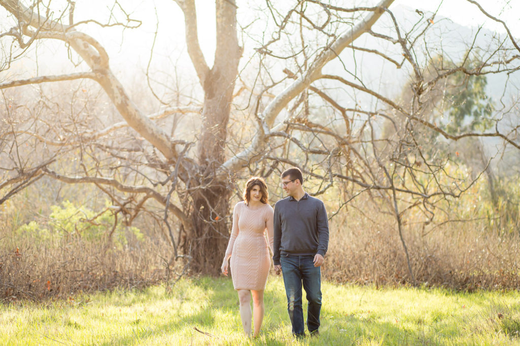 couple walking foster park engagement session