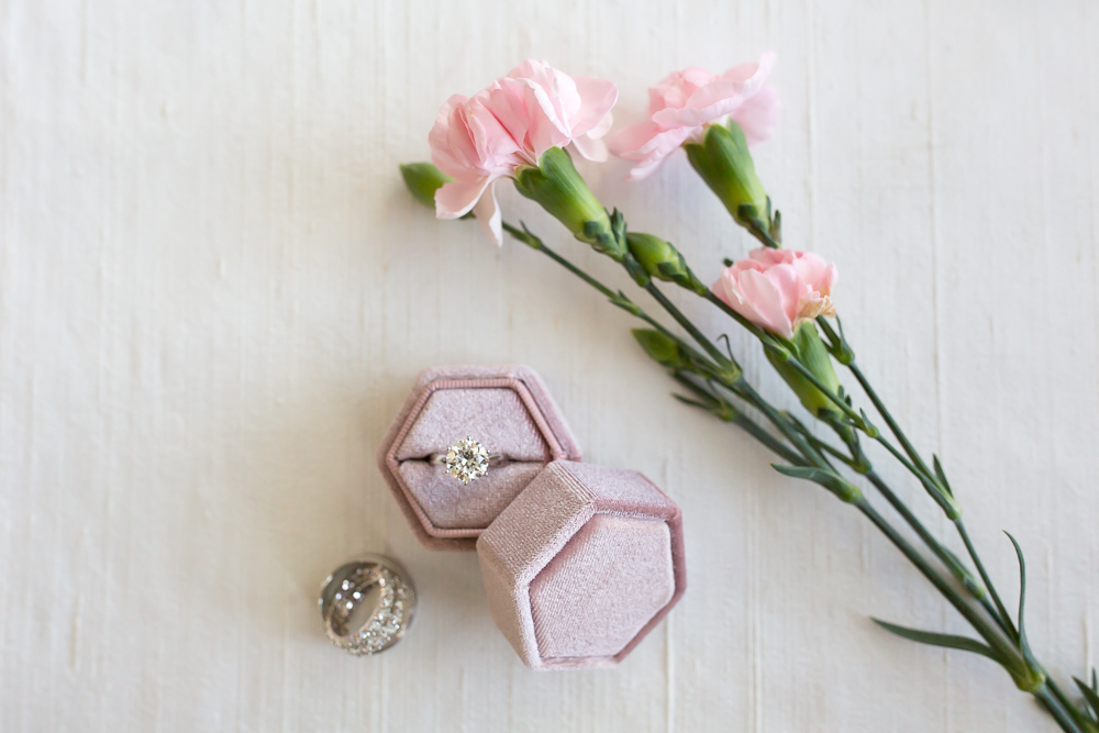 wedding ring in box by carnations Spanish hills country club wedding