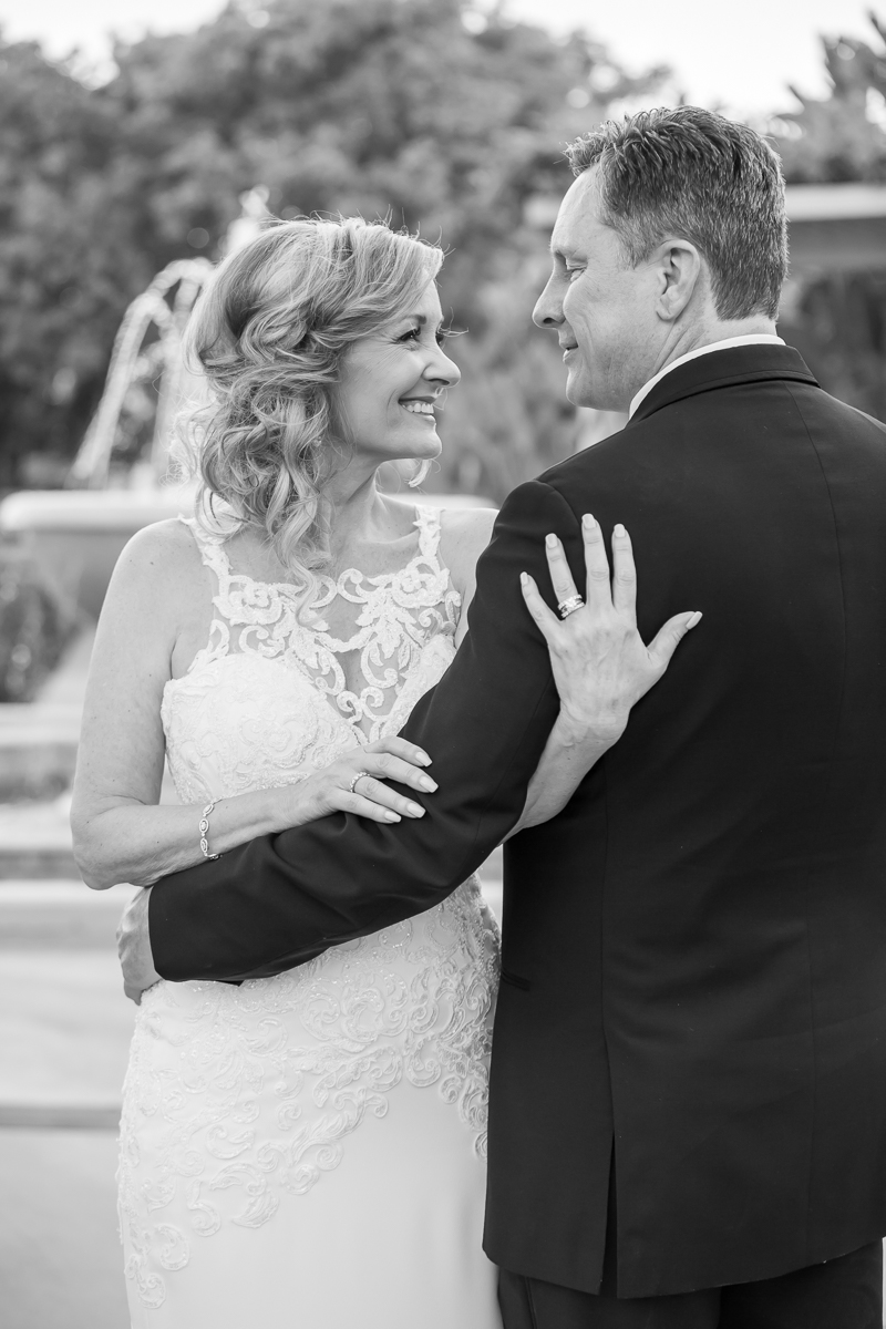 bride and groom in black and white Spanish hills country club wedding