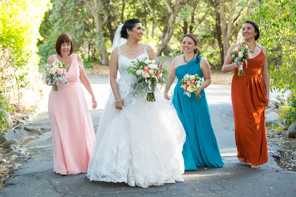 bride with bridesmaids walking wedding photography